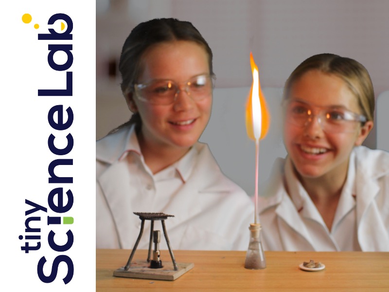 Homeschool children doing a science experiment with Tiny Science Lab kits