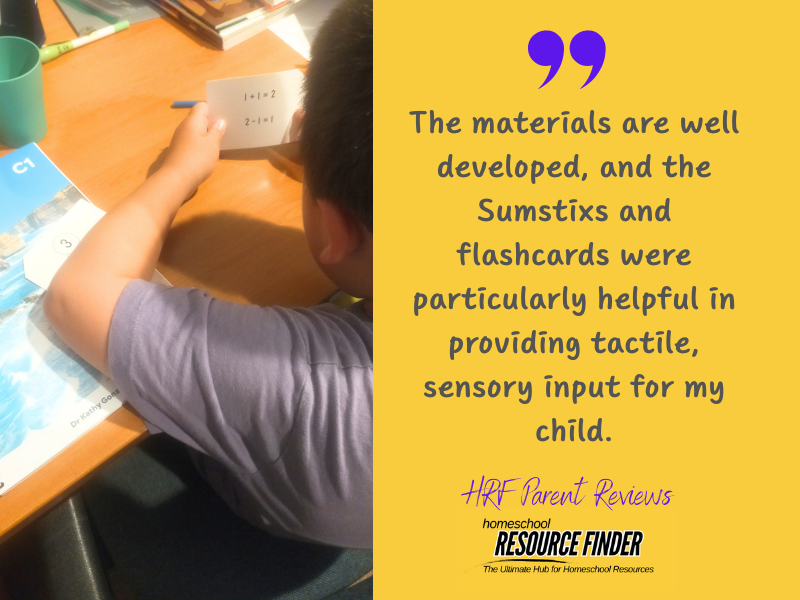 Homeschool child using milestone maths program level C. Text reads - the materials are well developed and teh Sumstixs and flashcards were particularly helpful in providing tactile sensory input for my child