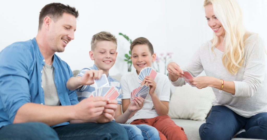 homeschool family playing a mental maths card game