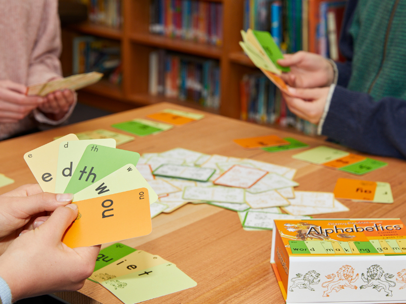 Homeschool family playing Alphabetics from the Fitzroy Reading Program